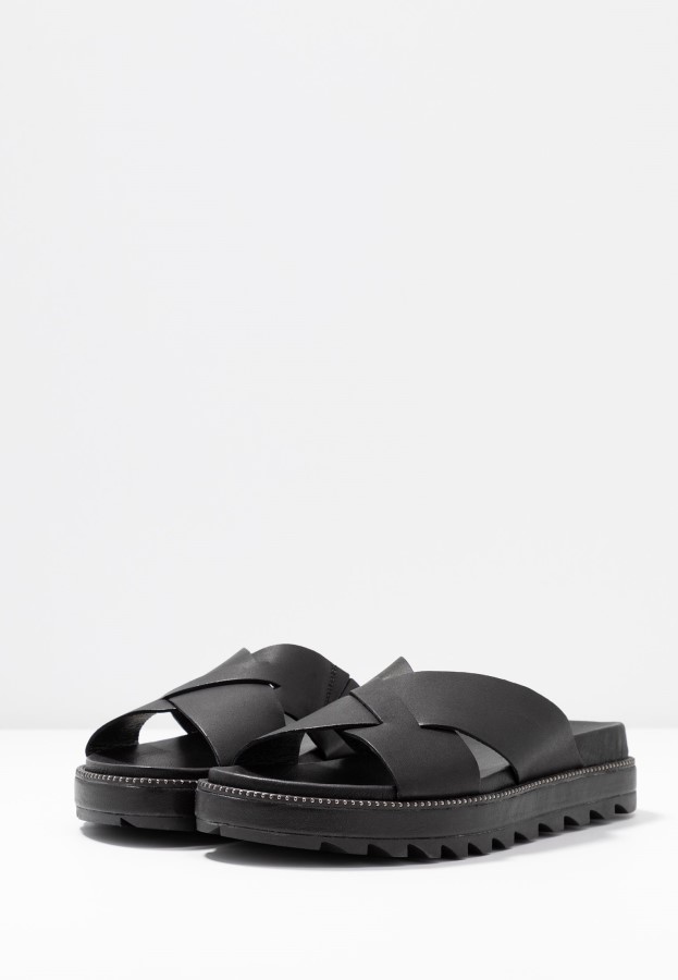 Black Roaming Criss Cross Slide Mules Sorel Australia